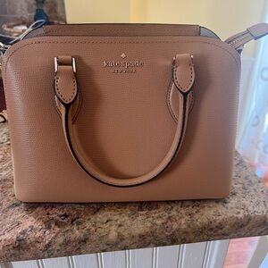 Light brown kate spade crossbody bag